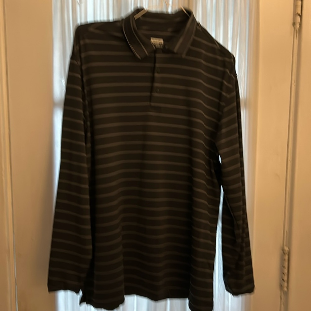 Men’s gray/white striped performance fabric long sleeve polo.